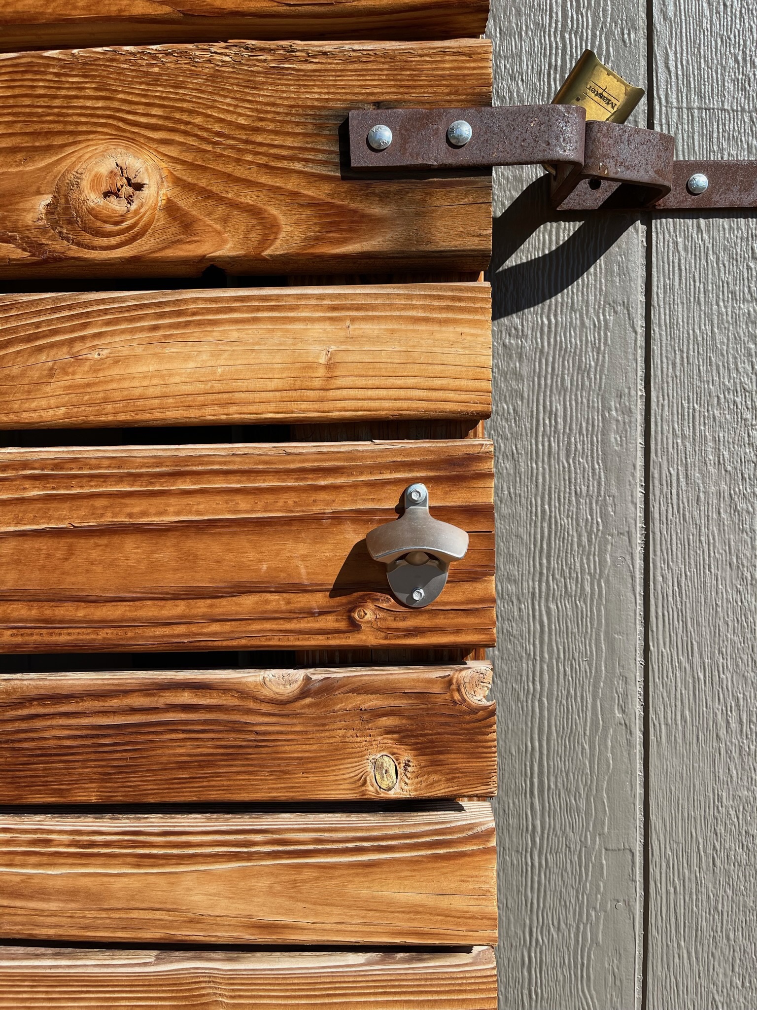 Cedar gate with bottle opener
