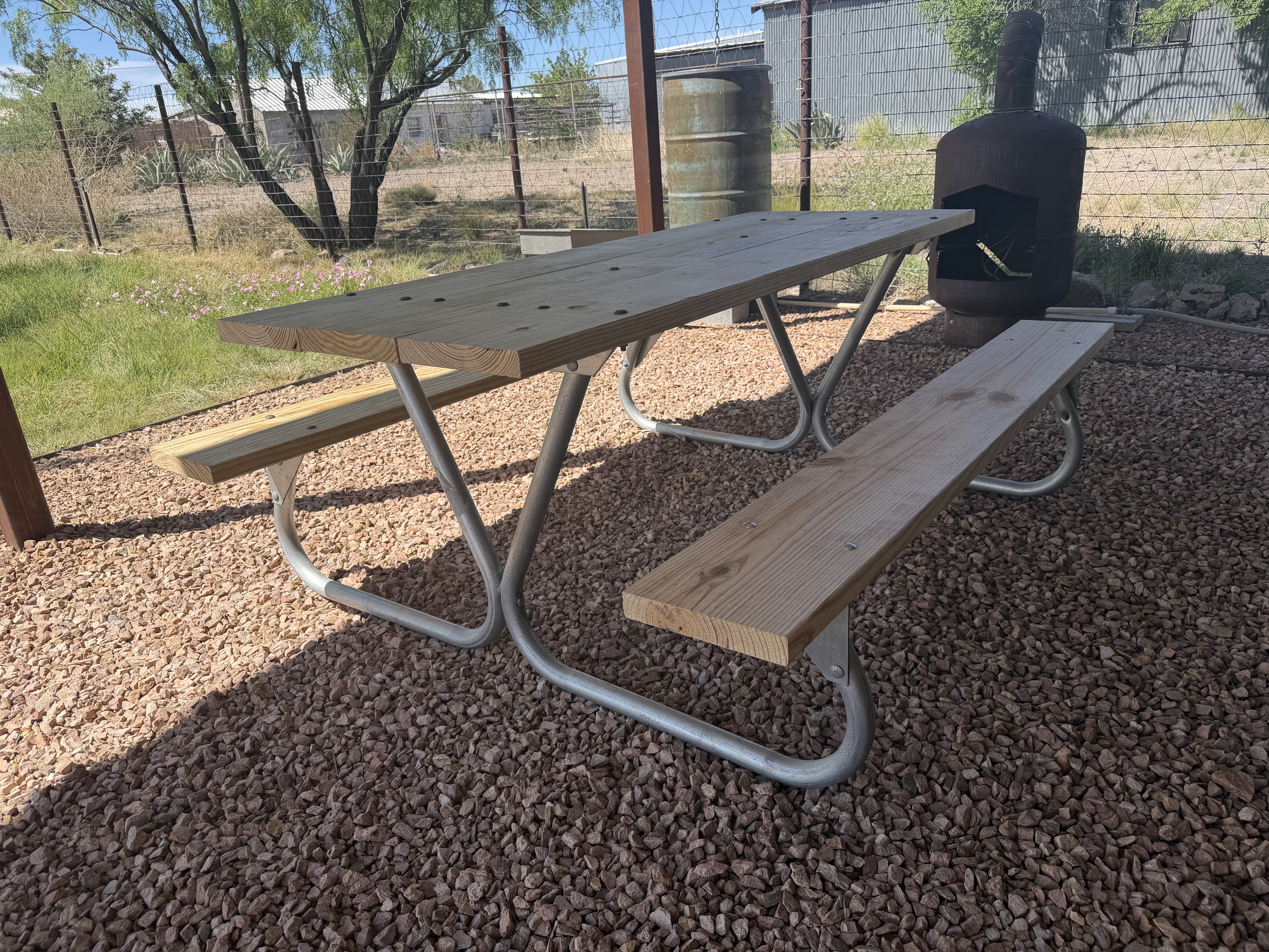 Picnic table and chiminea in the yard